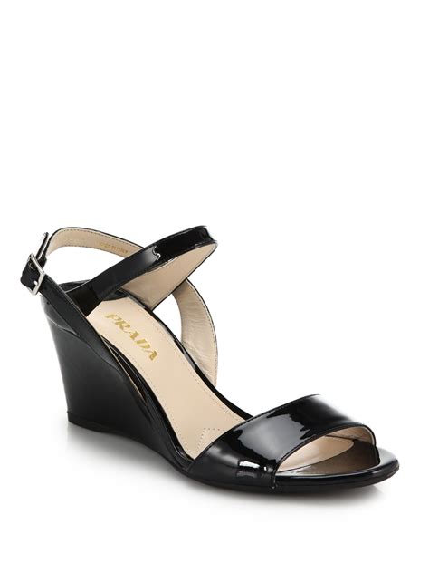 black patent leather wedges